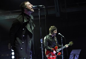 Liam and Noel Gallagher (R) of the band