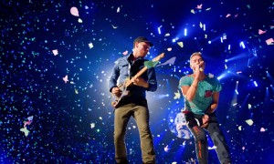 MONTREAL, QUE.: JULY 26, 2012 -- Chris Martin (right) and Jonny Buckland of the British band Coldplay in a confetti shower in concert at the Bell Centre in Montreal Thurssday, July 26, 2012. (John Kenney/THE GAZETTE)